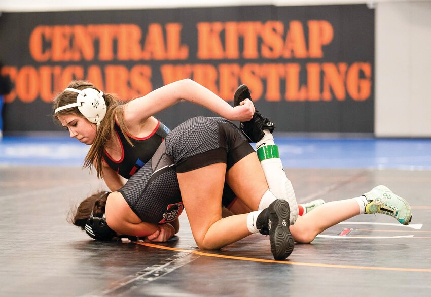 Savvy Grimm, shown at a tournament in January, will represent the district at the State Tournament as dual league champion in the 105-pound weight class.