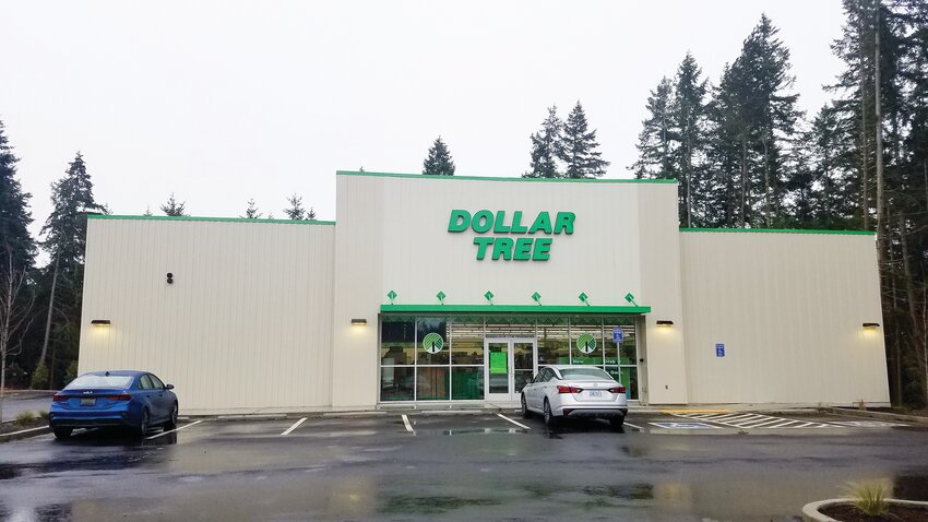 Cars are parked outside the new Dollar Tree store at 22 Christney Road in Port Hadlock on Saturday, Feb. 15, as employees inside work to get the store ready to open Feb. 20.