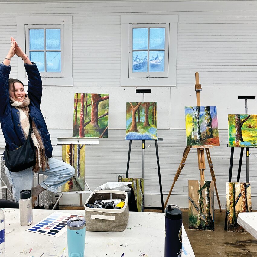 Stella Jorgensen offers a tree pose during a recent Northwind class about painting trees.
