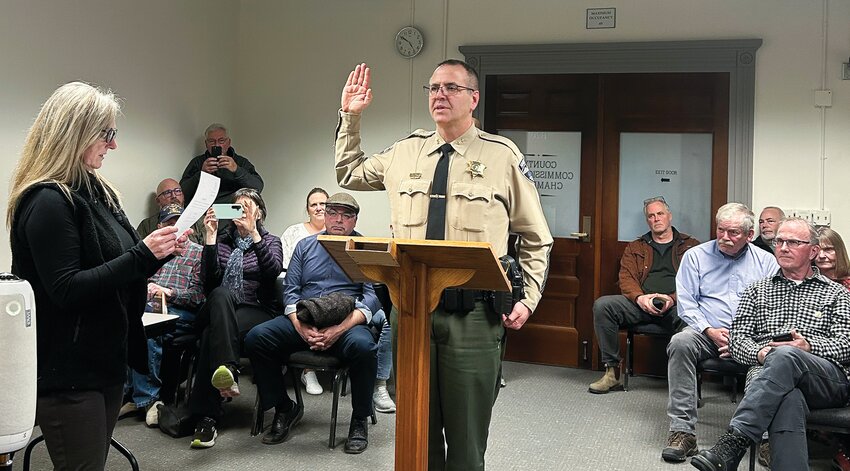 Andy Pernsteiner being sworn in as interim sheriff on Feb. 24.