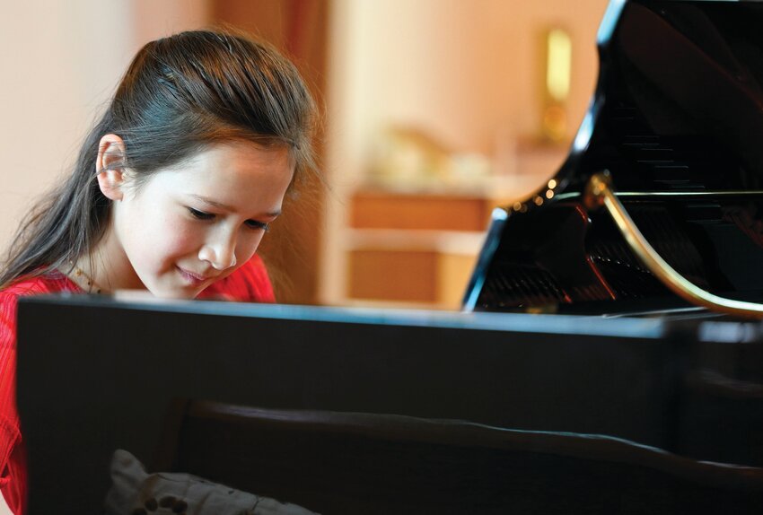 Annaleigh Harrison plays the piano in last year’s Young Artist Competition.