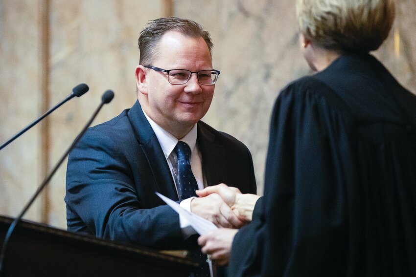 The office of Superintendent of Public Instruction Chris Reykdal, seen here being sworn into office on Jan. 15, 2025, has seen rising tensions with the federal government since President Donald Trump took office in January.