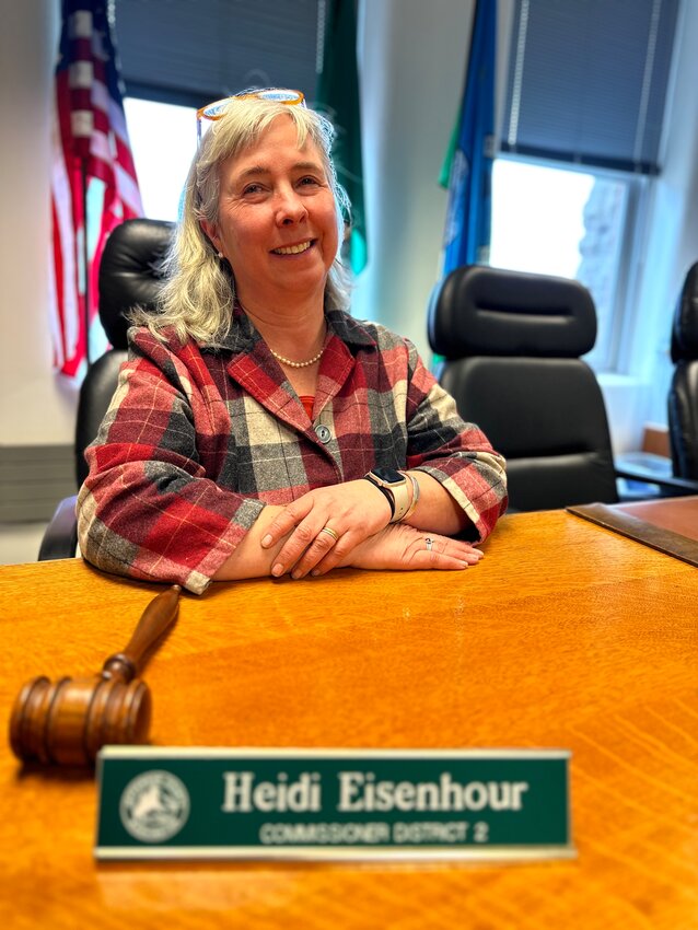 Commissioner Heidi Eisenhour sits behind the dais in the commissioners’ chambers at the Jefferson County Courthouse.