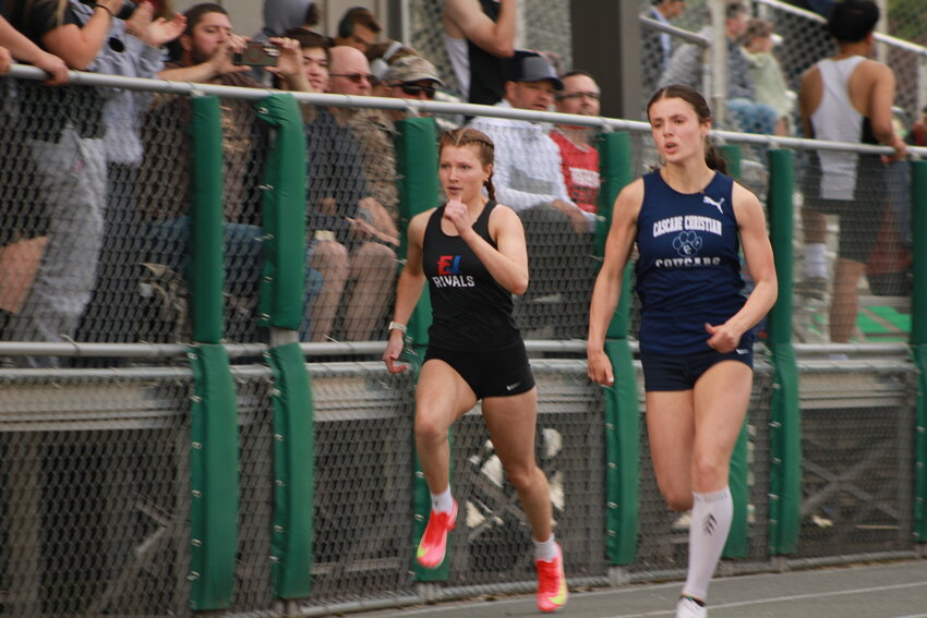 Carina Shiflett sprints for the line in the 100 meter dash.