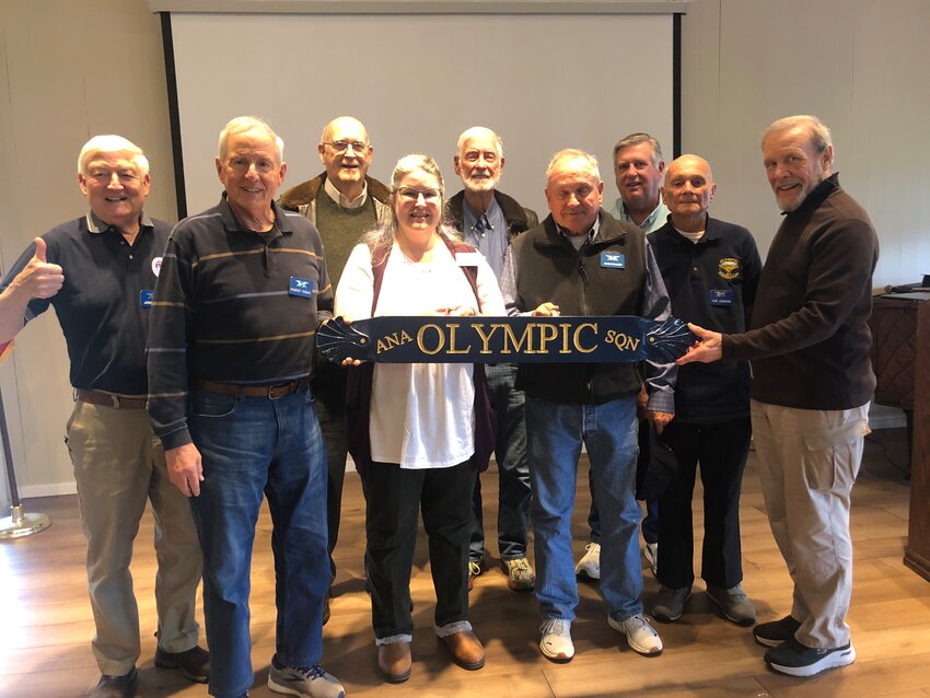 Members of the Olympic Squadron of the Association of Naval Aviation meeting in Port Ludlow.