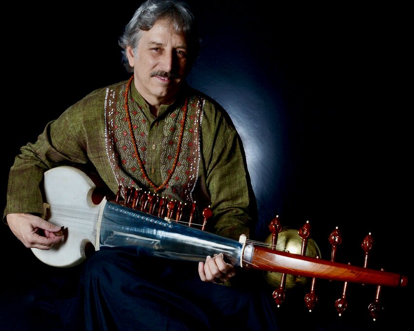 Richard Russell has devoted more than 40 years to studying how to play Indian music on the 25-string sarod.