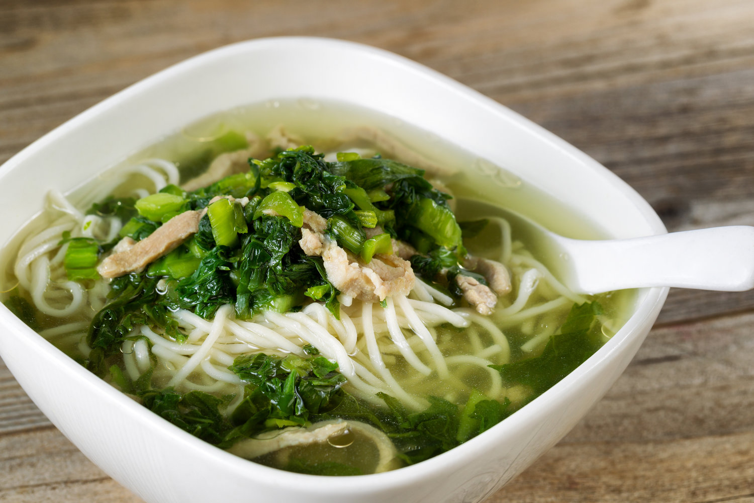 Chicken soup made with roasted chicken.