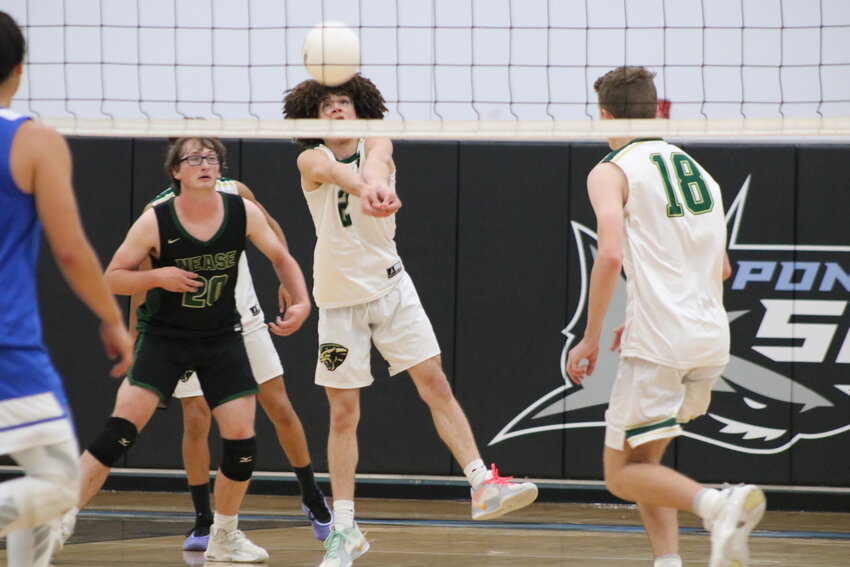 Brandon Centeno handles a serve hit his way.