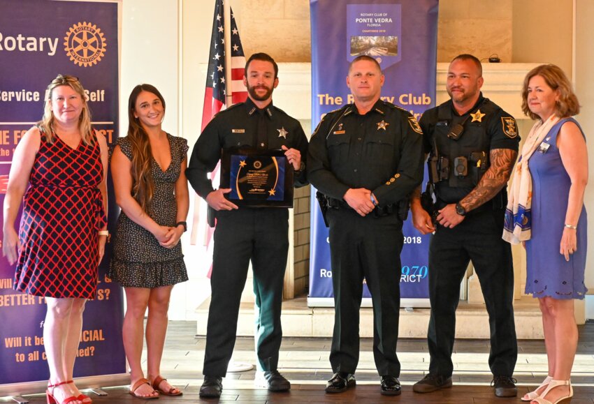 IQ Fiber Co-Founder and CMO Kim Smithers, Leah Spinks, Rotary Hero Deputy Dalton Spinks, SJSO Sheriff Rob Hardwick, Sgt. McDonnell, Ponte Vedra Rotary President Karen Everett