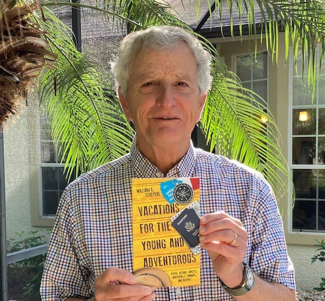 Local author William E. Schepens holds up a copy of &ldquo;Vacations for the Young and Adventurous,&rdquo; which won a silver medal in the Florida Authors and Publishers Association President&rsquo;s Book Awards.