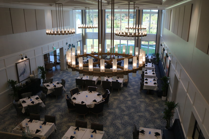 Looking down on the dining room in the clubhouse at Vicar&rsquo;s Landing at Oak Bridge.