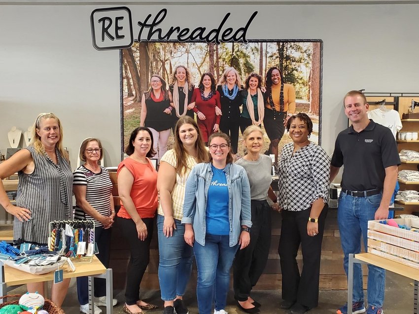 Pictured from left, Andrea Nichols, Donna Hodges, Veronica Davila, Claire Pitts, Rethreaded&rsquo;s Assistant Manager of Business Development Stephanie Patton, Kathy Stepulaitis, Margaret Ceaser and Kevin Waugaman.