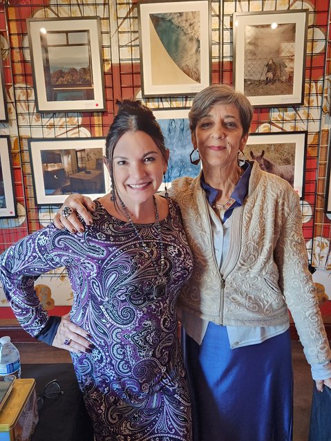 First Coast Cultural Center Executive Director Donna Guzzo with Paula Veloso during the world premiere of the &ldquo;The Eyes are the Window to the Soul&rdquo; exhibit.