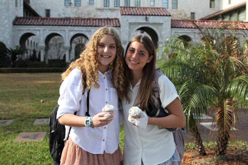 Two Bolles students prepare to enjoy their Founders&rsquo; Day cupcakes.