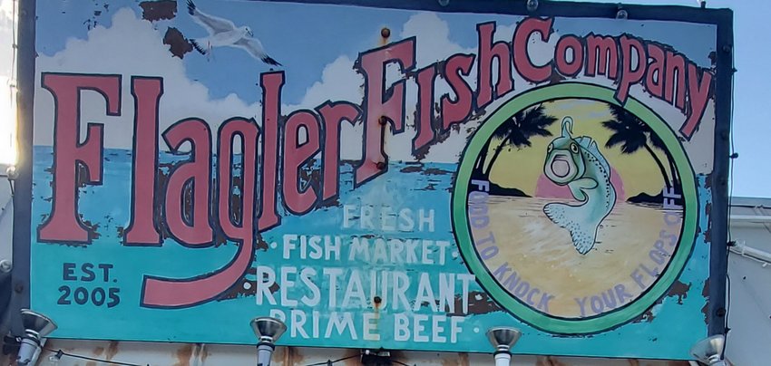 This vintage sign welcomes patrons to the Flagler Fish Company.