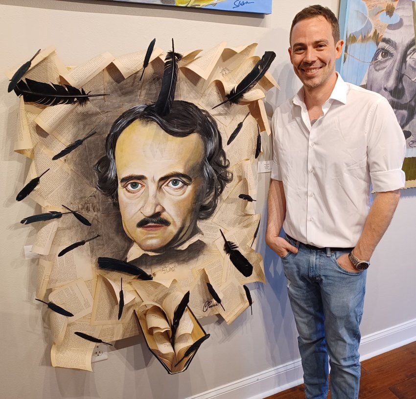 Artist Chase Parker with his eye-catching work, &ldquo;Poe,&rdquo; at the Grand Bohemian Gallery in St. Augustine.