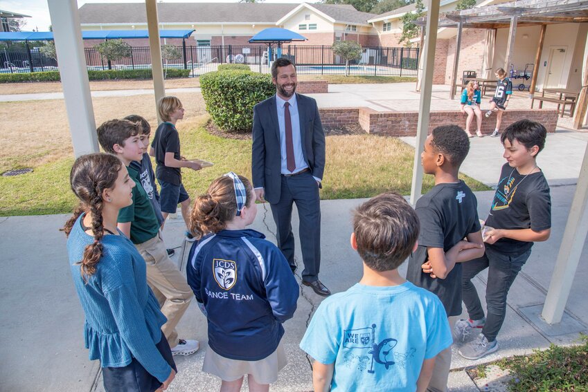 Incoming Head of School Christopher Johnson meets with students at Jacksonville Country Day School.