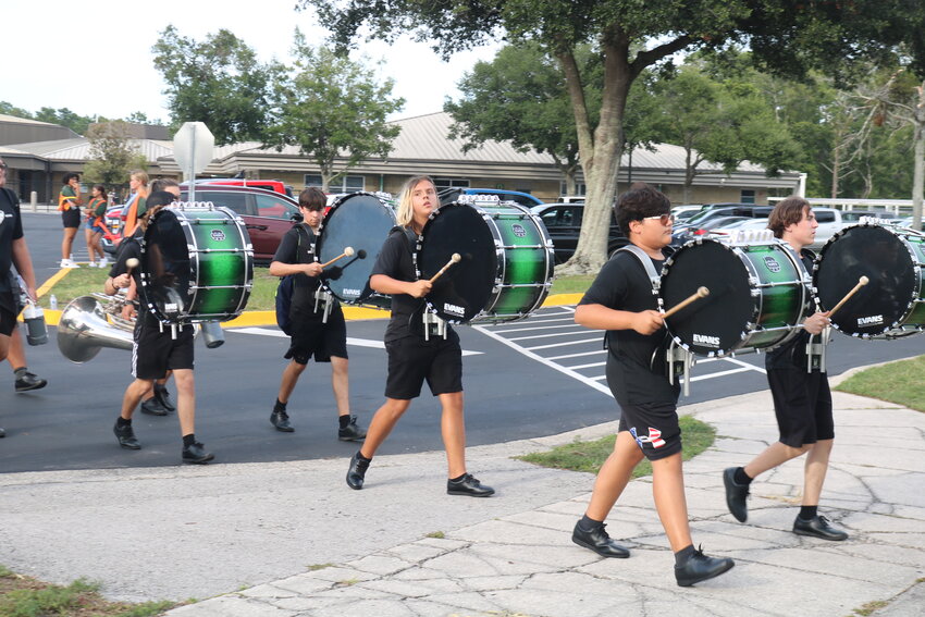 The Nease band marches into the stadium prior to the game.