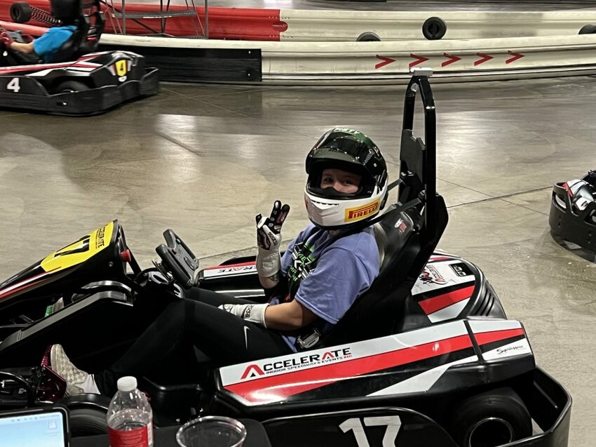 Alese Piety waves during the American E-Kart Championship.