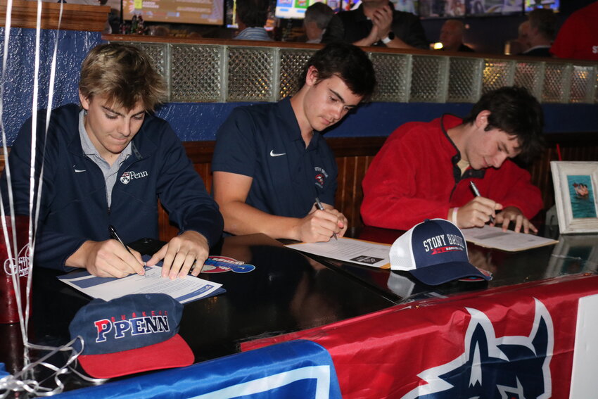 Jack Pelot, Tanner Parlette and Egan Funke signed to play college lacrosse during a ceremony Nov. 8.