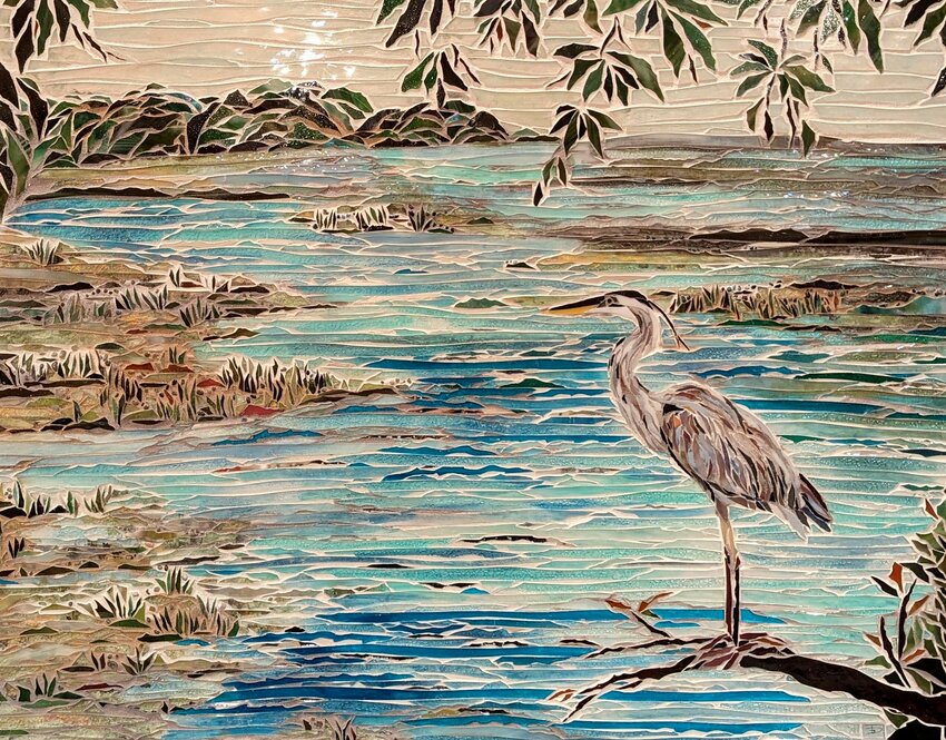 A heron on the water&rsquo;s edge is depicted in this mosaic.