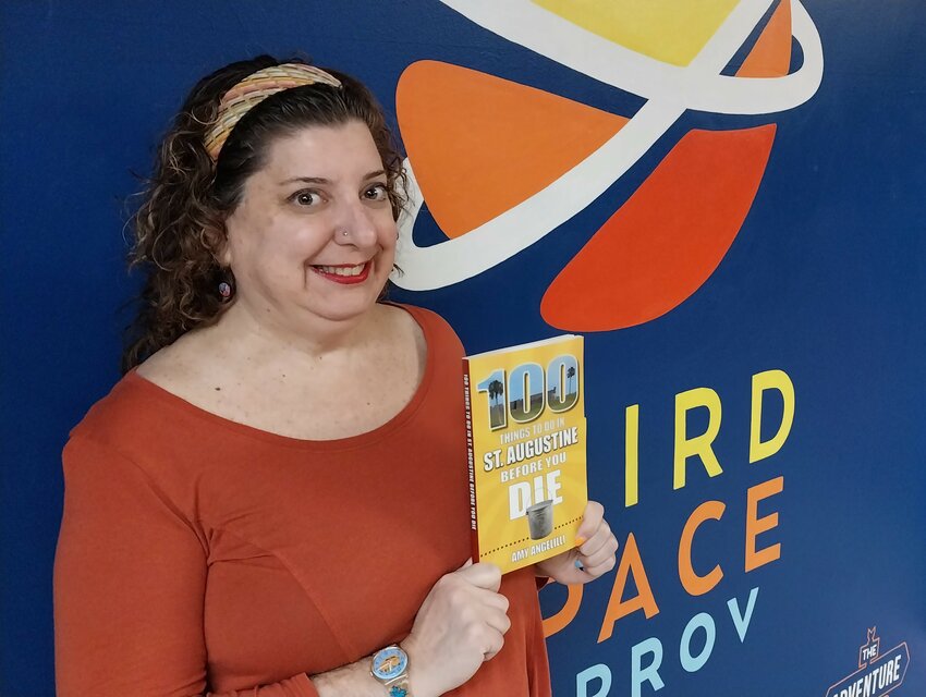 Amy Angelilli with her book, &ldquo;100 Things to Do in St. Augustine Before You Die&rdquo;