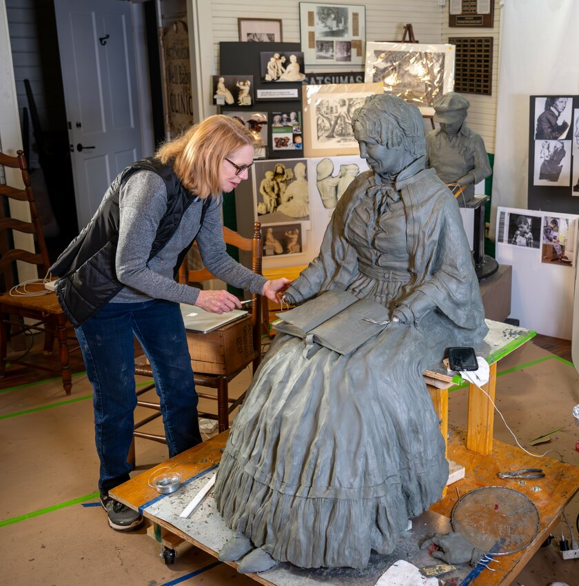 Sculptor Brenda Councill works on the future bronze installation of &quot;Harriet Beecher Stowe in Mandarin.&rdquo;