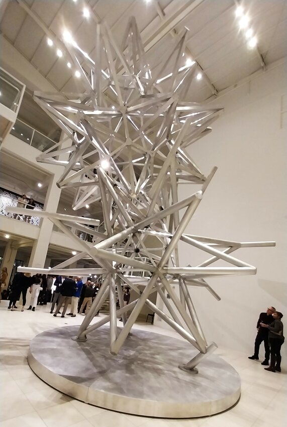 Visitors marvel at the enormous Frank Stella installation, &ldquo;Jacksonville Stacked Stars.&rdquo;
