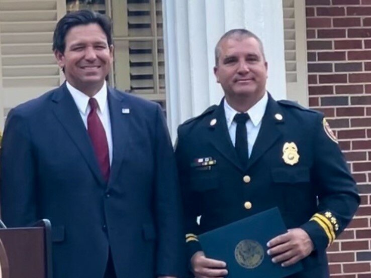 Gov. Ron DeSantis, left, and David Stevens at the Florida Heroes reception