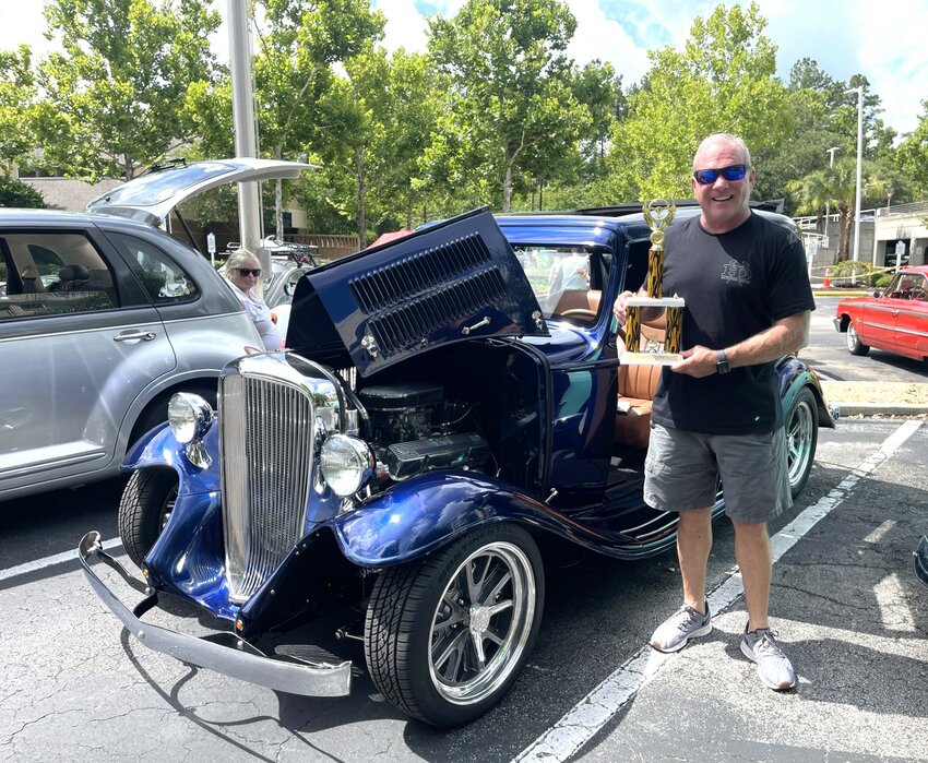 Mike Buddeke with his restored 1932 Hudson.