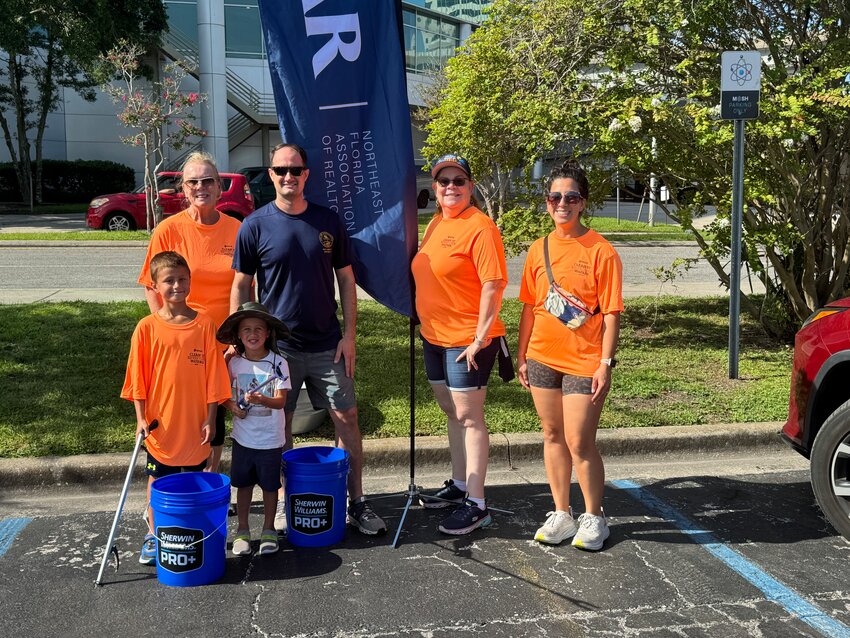 Jacksonville District 5 City Councilman Joe Carlucci and his family joined Nina Cliff and Margarita Cavanagh in cleaning up the Southbank underneath the Acosta Bridge on July 27 during the fourth annual NEFAR Clean-up Florida Waters event.