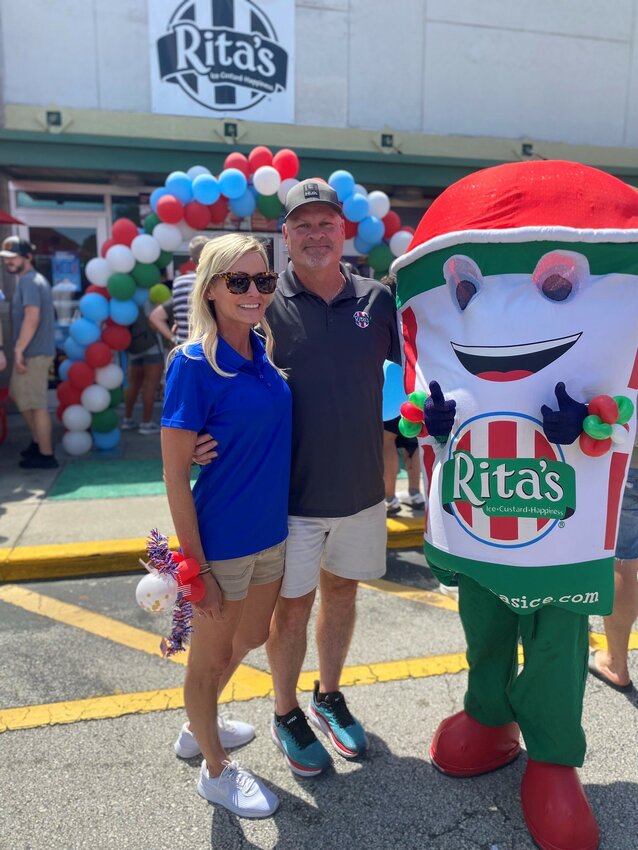 Jenny and Scott McLaughlin with Rita’s mascot, Ice Guy.