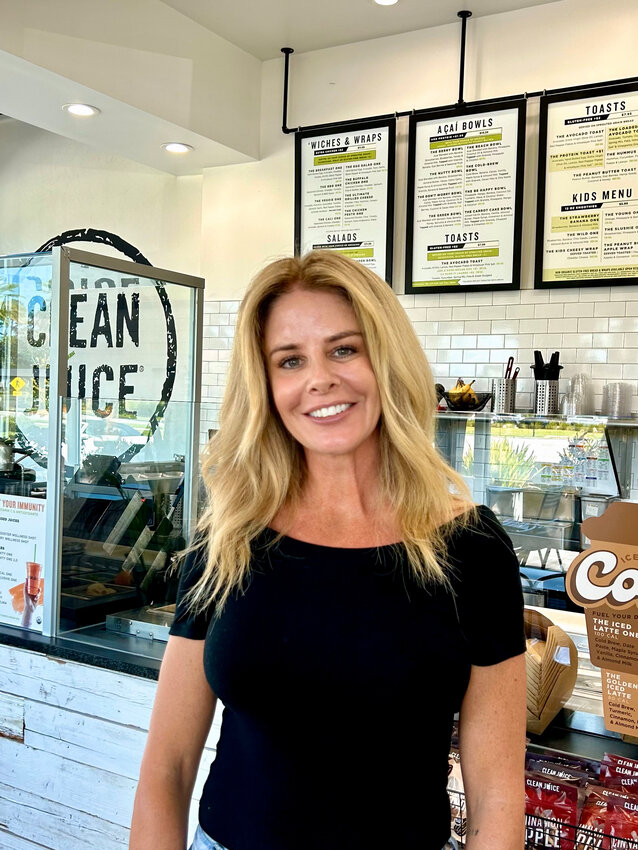 Clean Juice owner Angie Lacey is seen inside her shop.