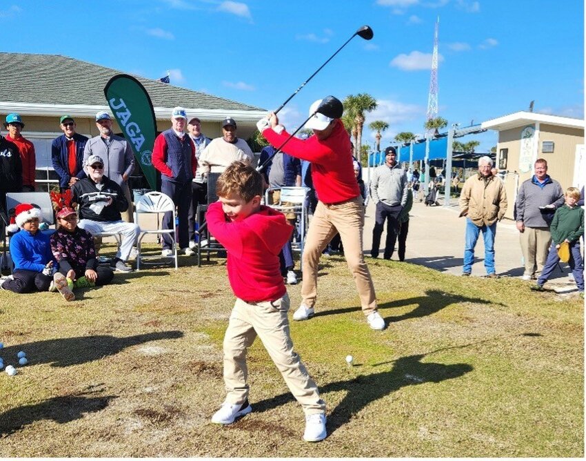 Axel and Billy Horschel showing off at the JAGA Family Championship