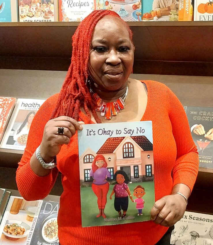 Sharron Collins with her first book, It&rsquo;s Okay to Say No.&rdquo;