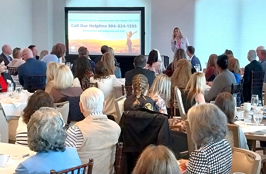 Keynote speaker Amanda Price, CEO of Florida Partnership to End Domestic Violence, addresses Betty Griffin Center Breakfast attendees.