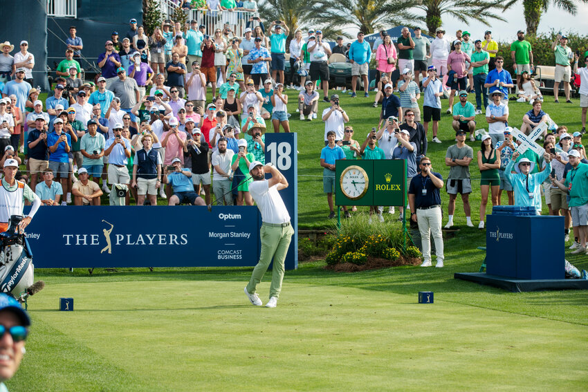 Scottie Scheffler plays the 18th hole in the 2024 PLAYERS Championship