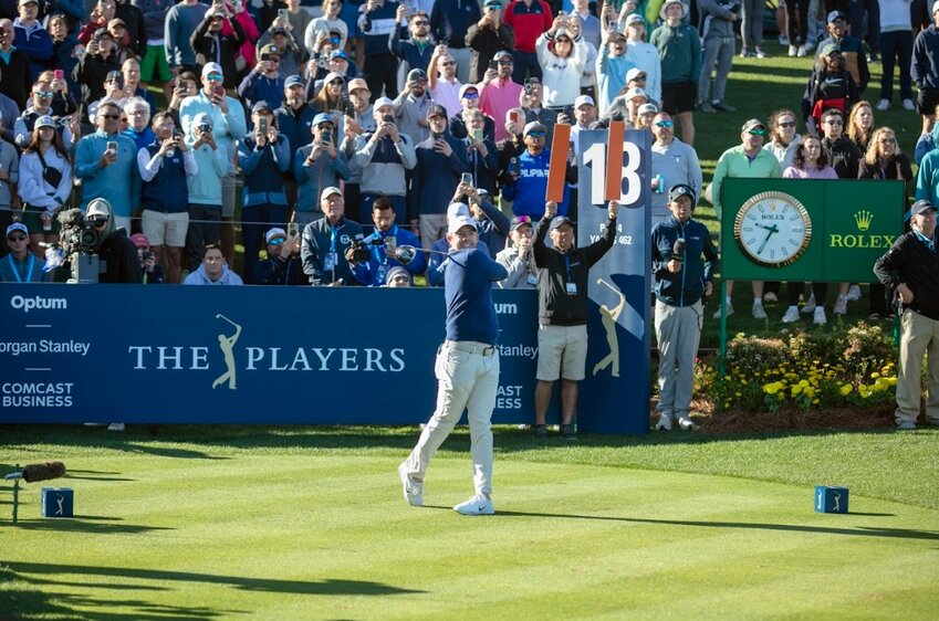Rory McIlroy hits his tee shot at No. 18 during the playoff on Monday.