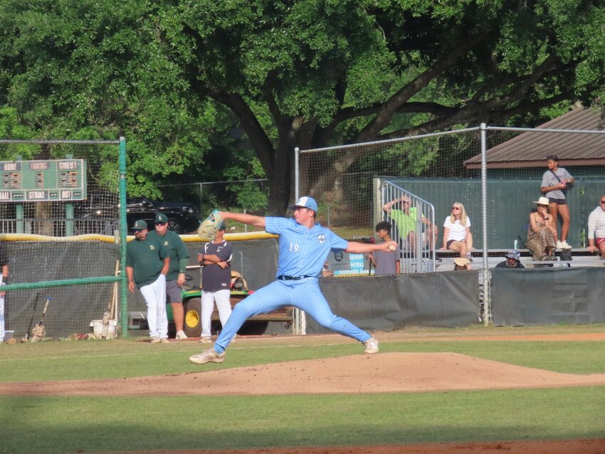 C.J. McKenzie fires a pitch during game one of the regional quarterfinal series against Tallahassee Lincoln.