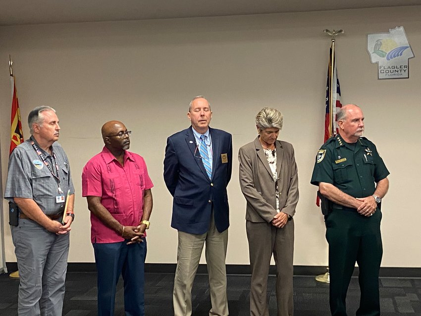 L-R: Flagler Beach City Manager William Whitson, Bunnell City Manager Alvin Jackson, Palm Coast Mayor David Alfin, Flagler Schools Superintendent Cathy Mittelstadt, and Flagler Sheriff Rick Staly.