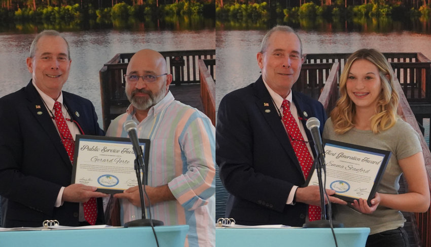Jerry Forte and Emma Stanford receive yearly awards from Mayor David Alfin. Pastor Charles Silano was not present to receive his.