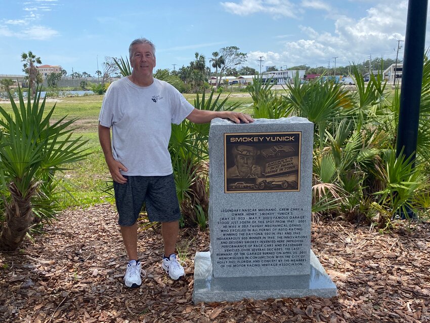 The Motor Racing Heritage Association's Steve Miller poses with the plaque he helped bring to Holly Hill.