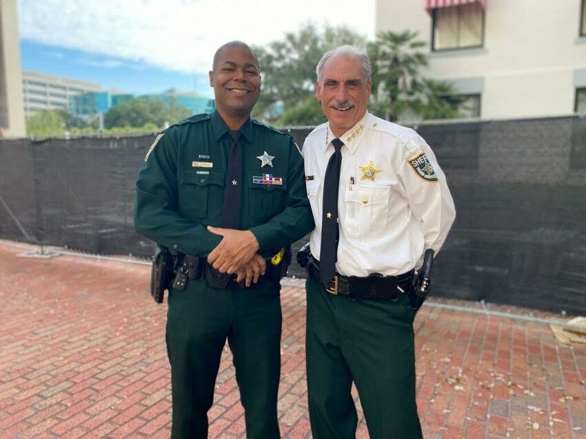 Deputy Royce James (left) and Volusia Sheriff Mike Chitwood.