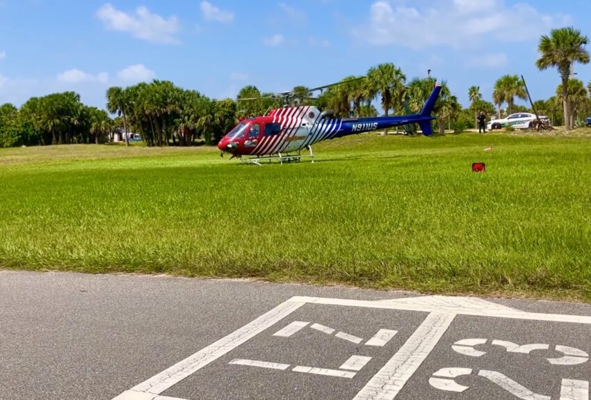 Flagler County’s FireFlight helicopted as it prepared to airlift the victim to Halifax Health in Daytona.
