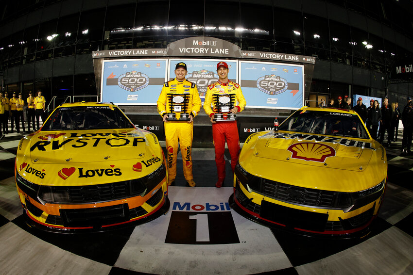 Pole-sitter Joey Logano (right) and runner-up Michael McDowell (left) after setting their scorching laps at Daytona International Speedway on Wednesday.