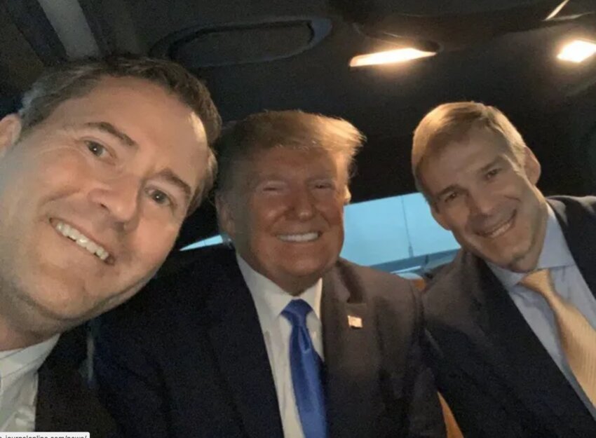 Waltz (left) with Trump and Congressman Jim Jordan in 2019.