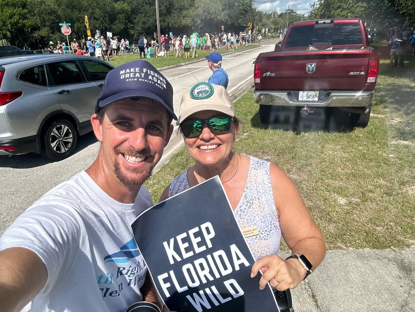 State legislature candidate Adam Morley and Sarah Gledhill, President & CEO of the Florida Wildlife Federation at Sunday's protest.