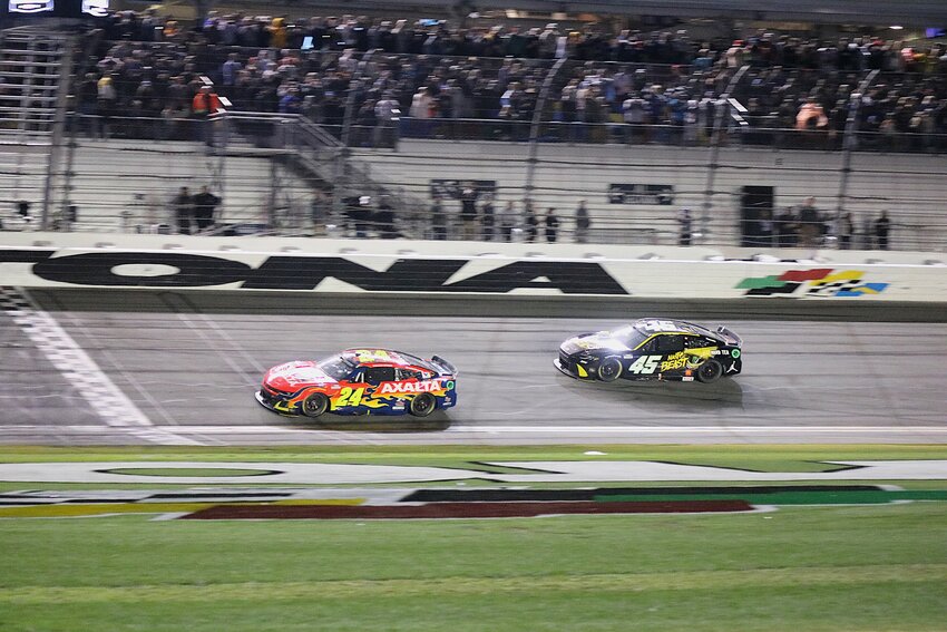 William Byron (24) holds off Tyler Reddick (45) for a historic Daytona 500 victory. | Eryn Harris