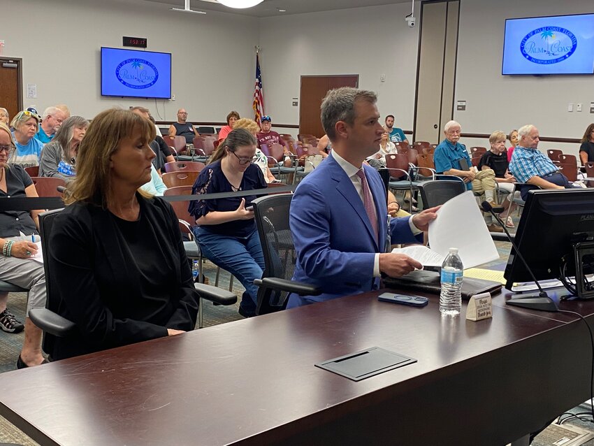 Palm Coast HR Director Renina Fuller (left) and attorney Adam Brandon (right) at Thursday’s meeting.