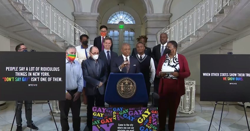 New York City Mayor Eric Adams (center) announcing the city's newest ad campaign in Florida, targeting the controversial &quot;Don't Say Gay&quot; bill